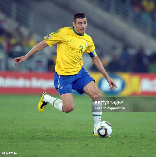 Lucio of Brazil in action during the FIFA World Cup Group G match between Portugal and Brazil at the Moses Mabhida Stadium on June 25, 2010 in...