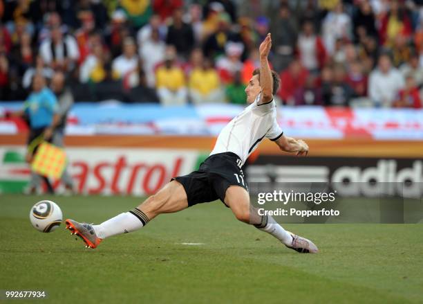 Miroslav Klose of Germany stretches to score a goal during the FIFA World Cup Round of 16 match between Germany and England at the Free State Stadium...