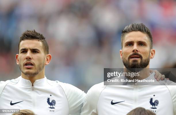 Lucas Hernandez of France and Olivier Giroud of France sing their national anthem prior to the 2018 FIFA World Cup Russia Quarter Final match between...