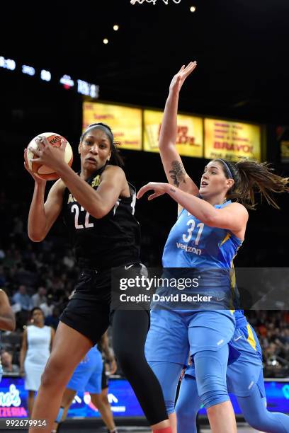 Ja Wilson of the Las Vegas Aces drives to the basket against center Stefanie Dolson of the Chicago Sky on July 5, 2018 at the Mandalay Bay Events...