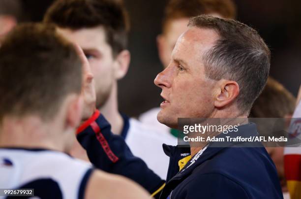 Don Pyke, Senior Coach of the Crows addresses his players during the 2018 AFL round 16 match between the Richmond Tigers and the Adelaide Crows at...