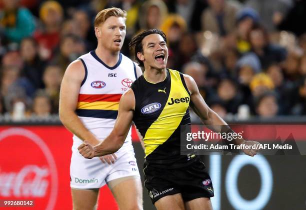 Daniel Rioli of the Tigers celebrates a goal during the 2018 AFL round 16 match between the Richmond Tigers and the Adelaide Crows at the Melbourne...