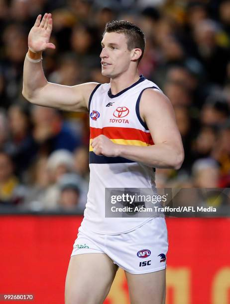 Josh Jenkins of the Crows celebrates a goal during the 2018 AFL round 16 match between the Richmond Tigers and the Adelaide Crows at the Melbourne...