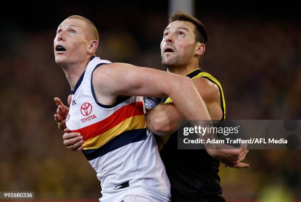 Toby Nankervis of the Tigers and Sam Jacobs of the Crows compete in a ruck contest during the 2018 AFL round 16 match between the Richmond Tigers and...