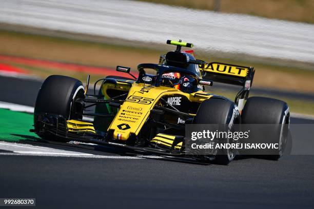 Renault's Spanish driver Carlos Sainz Jr drives during the second practice session at Silverstone motor racing circuit in Silverstone, central...