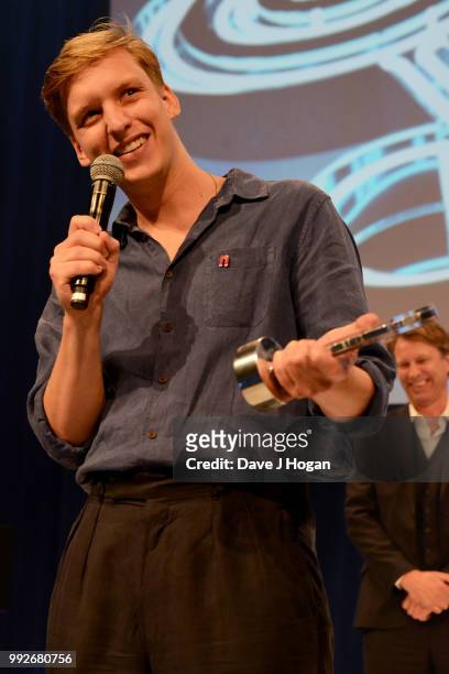 George Ezra, winner of the AEG Presents Best Male Award on stage during the Nordoff Robbins' O2 Silver Clef Awards ceremony at Grosvenor House, on...