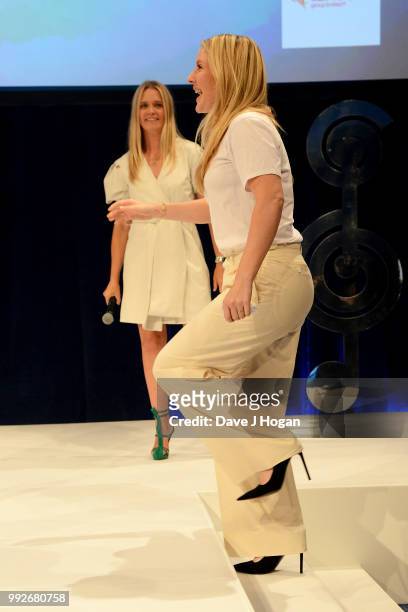 Host Edith Bowman and Ellie Goulding, winner of the Liz Hobbs Group Best Female Award on stage during the Nordoff Robbins' O2 Silver Clef Awards...