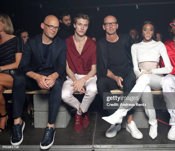 Mark Langer, Lucky Blue Smith, Ingo Wilts and Winnie Harlow attend the HUGO show during the Berlin Fashion Week Spring/Summer 2019 at Motorwerk on...