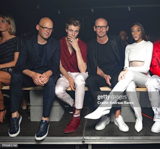 Mark Langer, Lucky Blue Smith, Ingo Wilts and Winnie Harlow attend the HUGO show during the Berlin Fashion Week Spring/Summer 2019 at Motorwerk on...