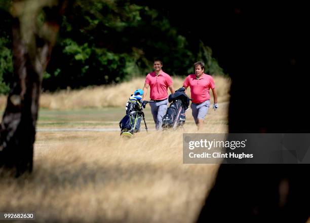 Greg Rogula and Steve Matthews of Leek Golf Club make their way up the 9th fairway during the Lombard Trophy North Qualifier at Fairhaven Golf Club...