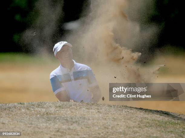 Mark Ridley of South Moor Golf Club plays out of a bunker on the 10th green during the Lombard Trophy North Qualifier at Fairhaven Golf Club on July...