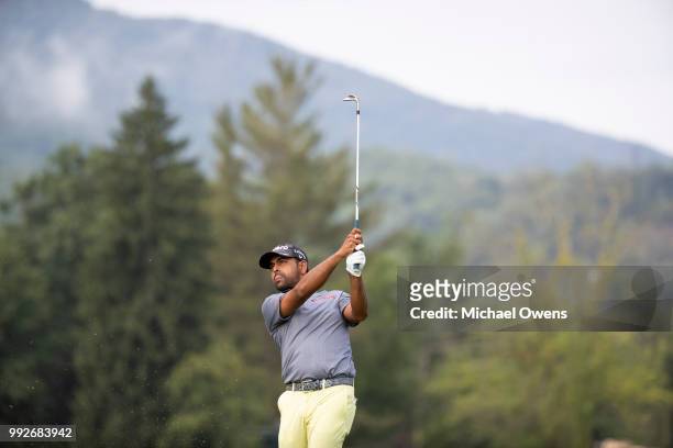 Anirban Lahiri of India hits his second shot on the 16th hole during round two of A Military Tribute At The Greenbrier held at the Old White TPC...