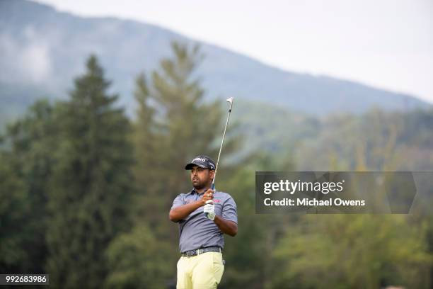 Anirban Lahiri of India hits his second shot on the 16th hole during round two of A Military Tribute At The Greenbrier held at the Old White TPC...