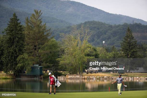 Anirban Lahiri of India walks to his ball on the 16th hole during round two of A Military Tribute At The Greenbrier held at the Old White TPC course...