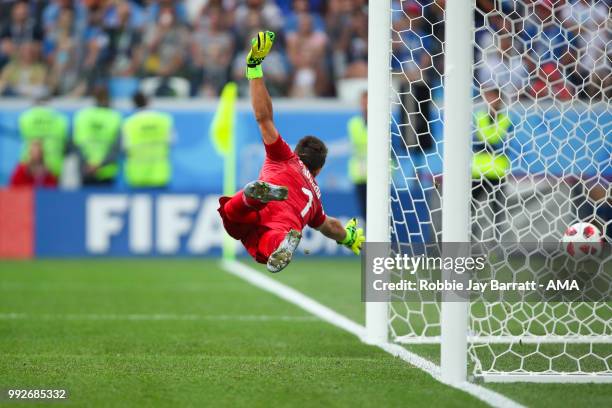 Fernando Muslera of Uruguay is unable to stop Raphael Varane of France scoring a goal to make it 0-1 during the 2018 FIFA World Cup Russia Quarter...