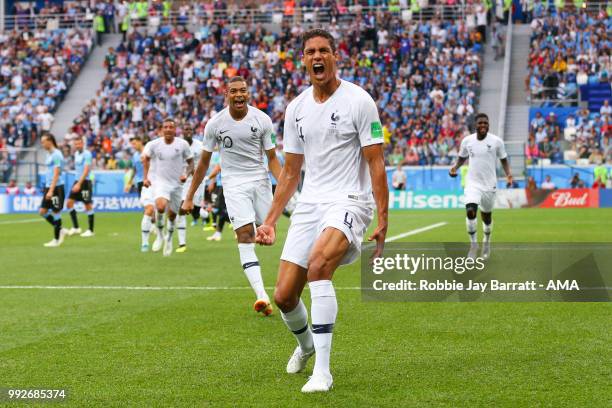 Raphael Varane of France celebrates scoring a goal to make it 0-1 during the 2018 FIFA World Cup Russia Quarter Final match between Uruguay and...