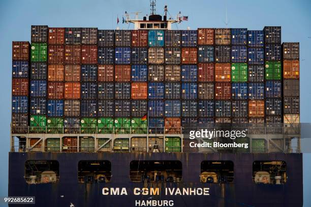 Shipping containers sit stacked on the CMA CGM Ivanhoe cargo ship sailing from the Port of Oakland in Oakland, California, U.S., on Tuesday, July 3,...