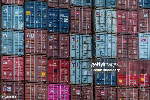 Shipping containers sit stacked on a cargo ship at the Port of Oakland in Oakland, California, U.S., on Tuesday, July 3, 2018. President Donald...