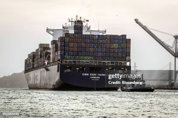 The CMA CGM Ivanhoe container ship sails from the Port of Oakland in Oakland, California, U.S., on Tuesday, July 3, 2018. President Donald...