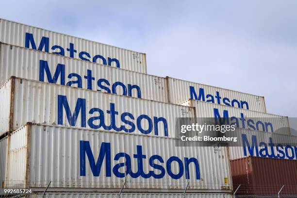 Matson Inc. Shipping containers sit stacked at the Port of Oakland in Oakland, California, U.S., on Thursday, July 5, 2018. President Donald...