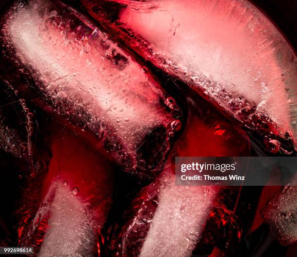 grape juice and ice - glas stock pictures, royalty-free photos & images