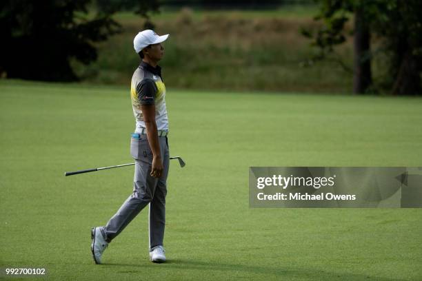 Whee Kim of Korea looks on after hitting his second shot on the 13th hole during round two of A Military Tribute At The Greenbrier held at the Old...