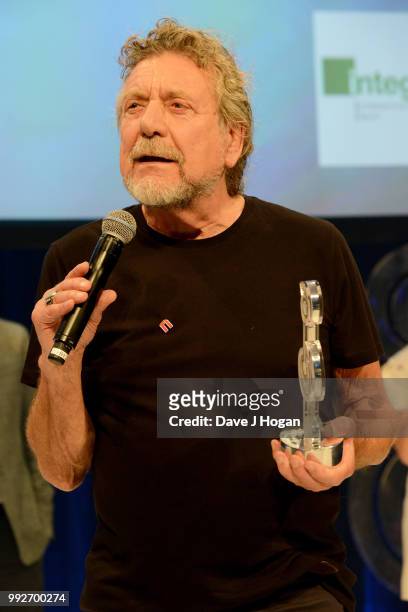 Robert Plant, winner of the Integro Outsanding Award on stage during the Nordoff Robbins' O2 Silver Clef Awards ceremony at Grosvenor House, on July...