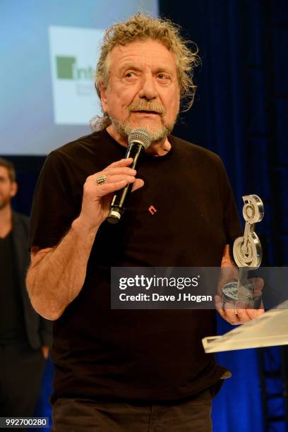 Robert Plant, winner of the Integro Outsanding Award on stage during the Nordoff Robbins' O2 Silver Clef Awards ceremony at Grosvenor House, on July...