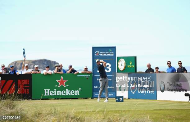 Nicolas Colsaerts of Belgium tees off on the 13th hole during the second round of the Dubai Duty Free Irish Open at Ballyliffin Golf Club on July 6,...