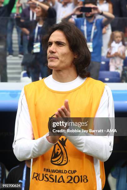 Edison Cavani of Uruguay looks on from the bench prior to the 2018 FIFA World Cup Russia Quarter Final match between Uruguay and France at Nizhny...