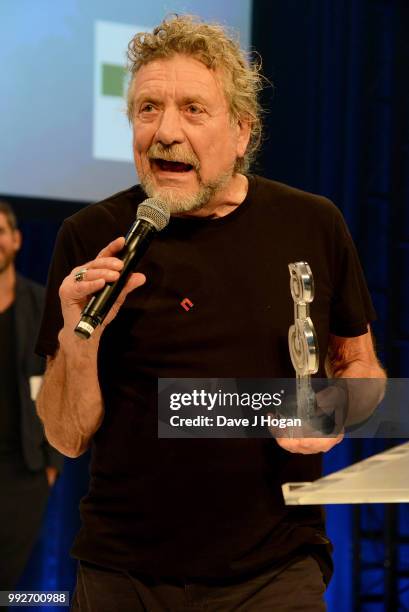 Robert Plant, winner of the Integro Outsanding Award on stage during the Nordoff Robbins' O2 Silver Clef Awards ceremony at Grosvenor House, on July...