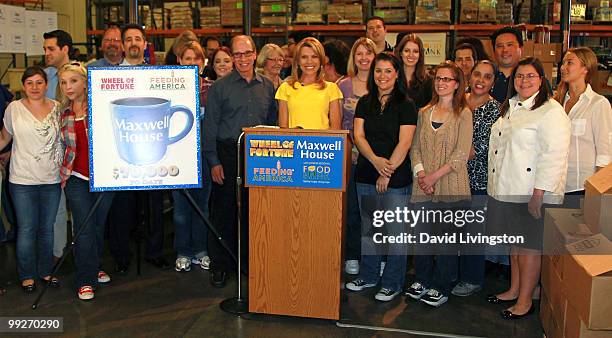 Vanna White , executive producer Harry Friedman and ''Wheel of Fortune'' staff members visit the Los Angeles Regional Foodbank on May 13, 2010 in Los...