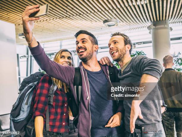 business people in departure lounge - premium access images stock pictures, royalty-free photos & images