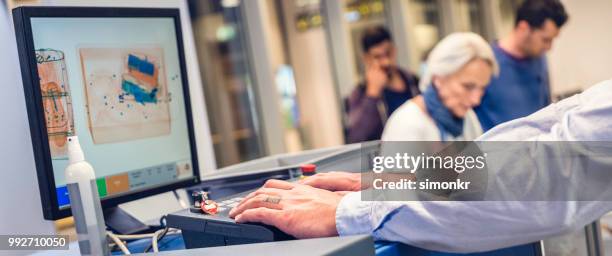 airport security check - metal detector security stock pictures, royalty-free photos & images