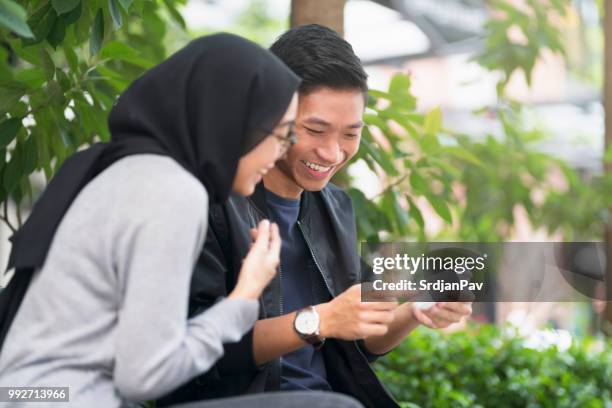 watching funny memes online - memes stock pictures, royalty-free photos & images