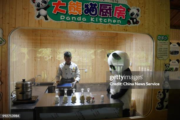 Keepers prepare food for giant pandas at the Yunnan Wildlife Park on July 3, 2018 in Kunming, Yunnan Province of China. Yunnan Wildlife Park opened a...