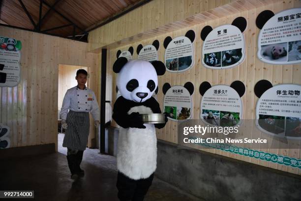 Keepers prepare food for giant pandas at the Yunnan Wildlife Park on July 3, 2018 in Kunming, Yunnan Province of China. Yunnan Wildlife Park opened a...