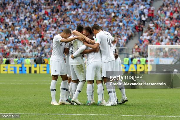 Antoine Griezmann of France scores with team mates his team's second goal during the 2018 FIFA World Cup Russia Quarter Final match between Uruguay...