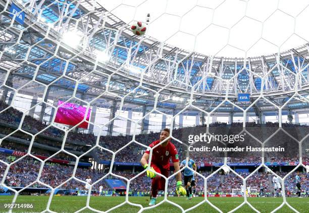 Fernando Muslera of Uruguay fumbles the ball as Antoine Griezmann of France scores his team's second goal during the 2018 FIFA World Cup Russia...