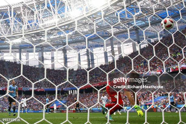 Fernando Muslera of Uruguay fumbles the ball as Antoine Griezmann of France scores his team's second goal during the 2018 FIFA World Cup Russia...