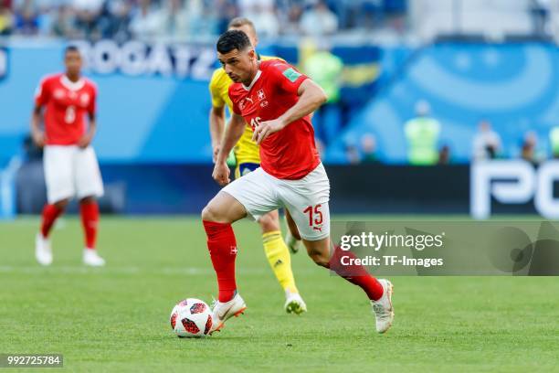 Blerim Dzemaili of Switzerland controls the ball during the 2018 FIFA World Cup Russia Round of 16 match between Sweden and Switzerland at Saint...