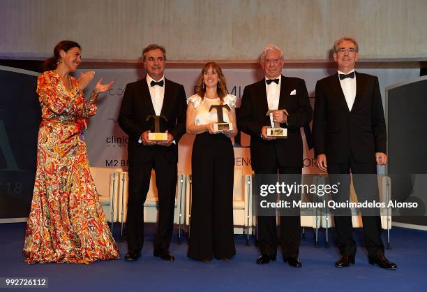 Telva magazine director Olga Ruiz, Carlos Sainz, Maite Mendioroz, Mario Vargas LLosa and Telva magazine president Antonio Fernandez-Galiano attend...