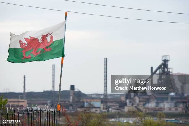 Wales flag flies in front of Tata Steel steelworks on April 21, 2016 in Port Talbot, United Kingdom. Tata and ThyssenKrupp have announced plans to...