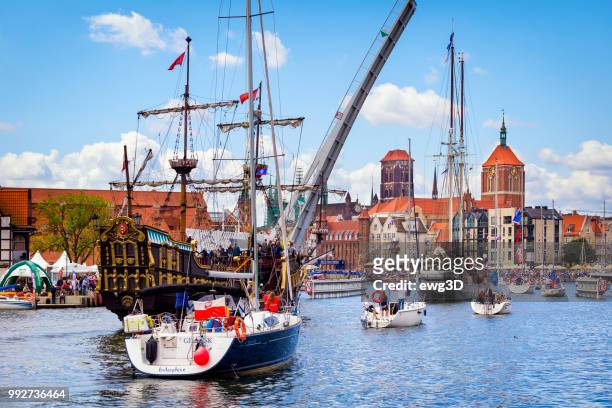 vacations in poland - sailing ships on the motlawa river in old town in gdansk, poland - bascule bridge stock pictures, royalty-free photos & images