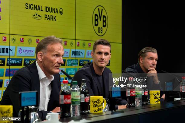 Hans-Joachim Watzke of Dortmund, Head of the Licensing Player Department Sebastian Kehl of Dortmund and Sporting director Michael Zorc of Dortmund...