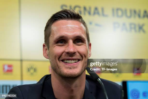 Head of the Licensing Player Department Sebastian Kehl of Dortmund laughs during the press conference on July 3, 2018 in Dortmund, Germany.