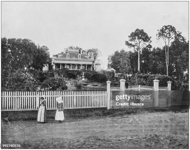 antique photograph of america's famous landscapes: plantation home, mississippi - plantation house stock illustrations