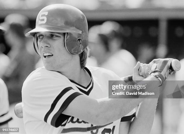 Future NFL quarterback John Elway of Stanford University warming up during an NCAA baseball game against USC in April 1980 at Sunken Diamond stadium...