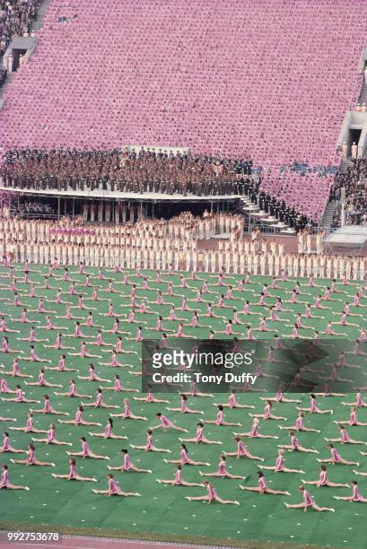 Athletes and musicians perform during the Opening Ceremony event for the XXII Olympic Summer Games on 19 July 1980 at the Grand Arena of the Central...