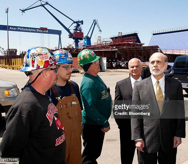 Ben S. Bernanke, chairman of the U.S. Federal Reserve, right, takes a tour of the Aker Philadelphia Shipyard with Charles Pizzi, president and chief...